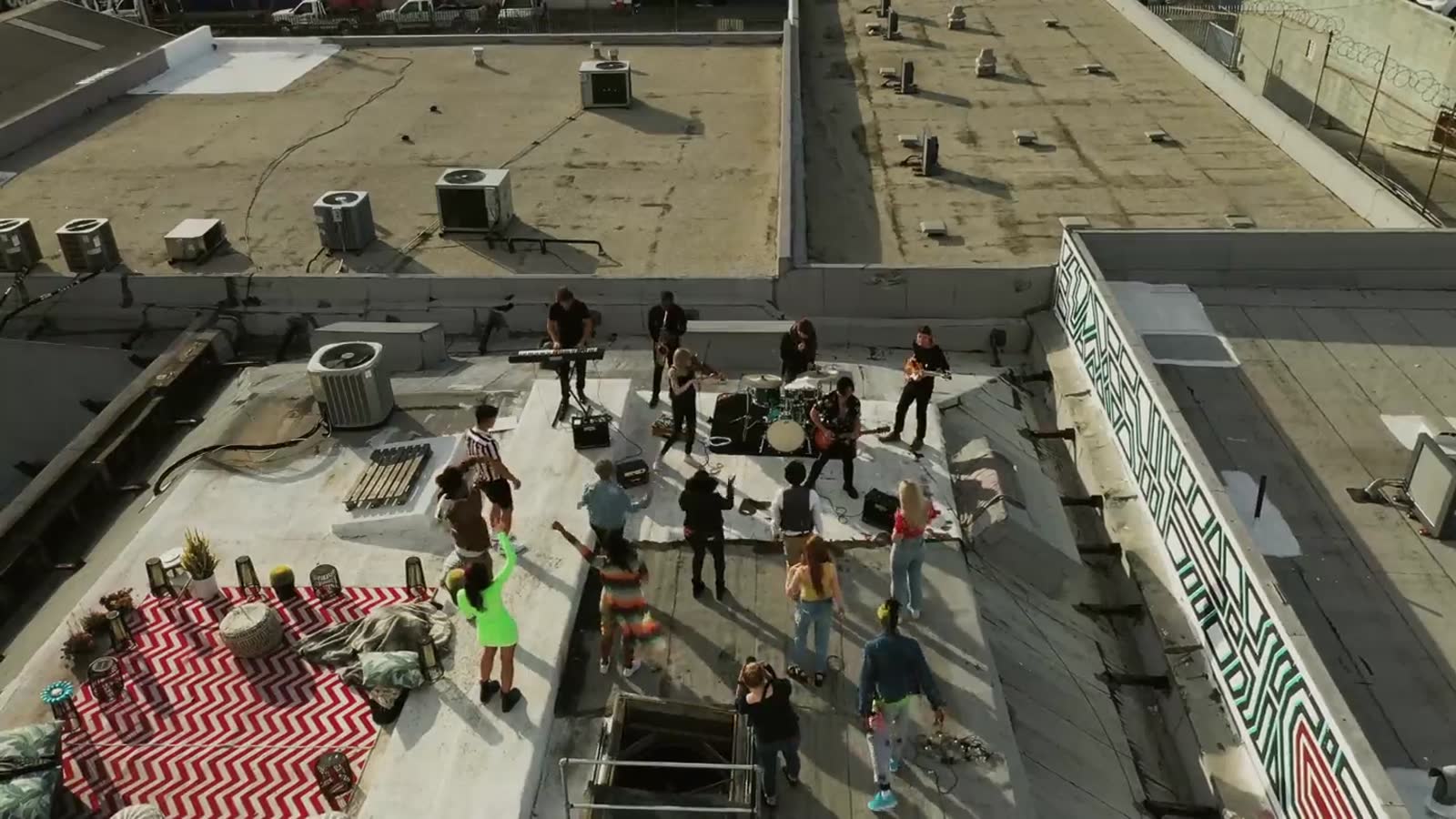 A gathering on a rooftop seen from above
